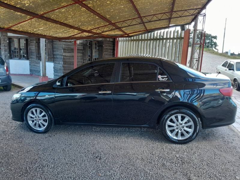 TOYOTA - COROLLA - 2010/2011 - Preta - R$ 61.000,00