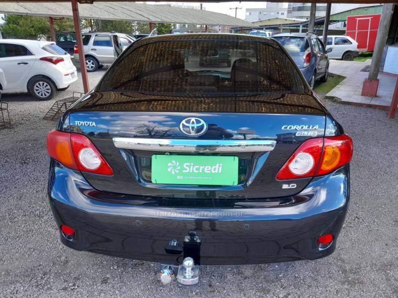 TOYOTA - COROLLA - 2010/2011 - Preta - R$ 61.000,00